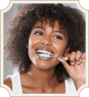 lady enthusiastically brushing her teeth