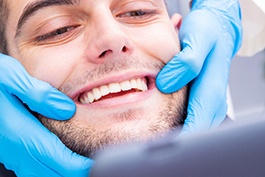 Close up of man smiling during dental checkup