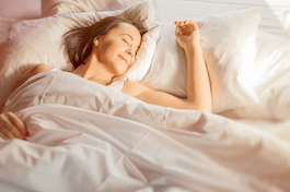 Woman sleeping soundly in bed