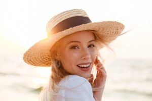 Woman at beach with dental implants